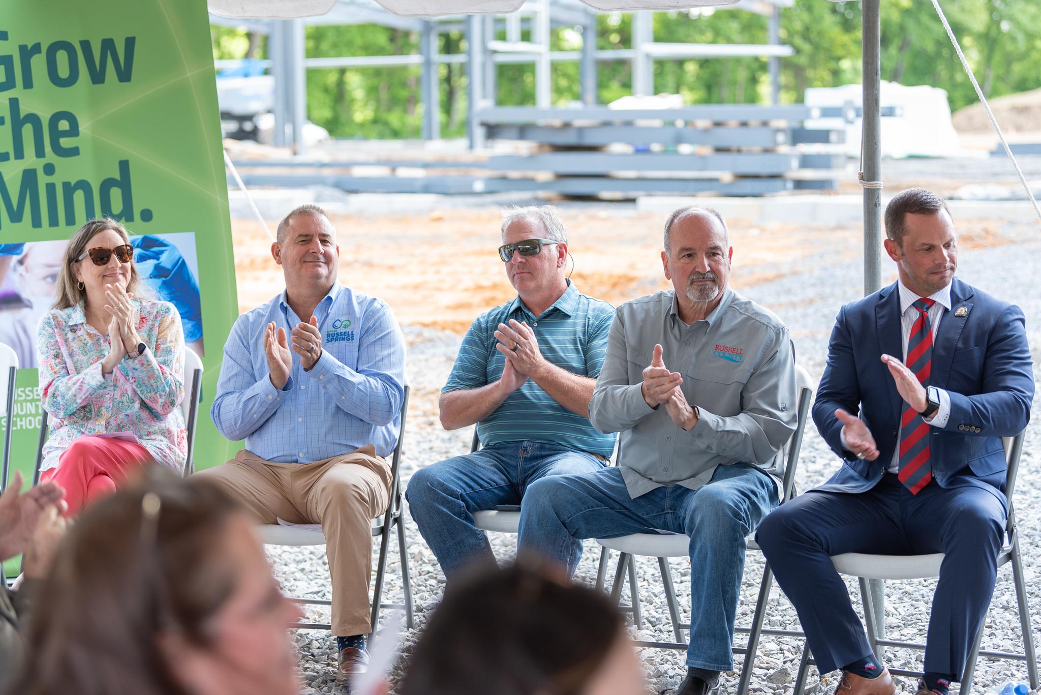RCIDA board members clapping during presentatioin