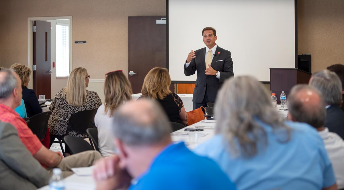 Man speaking at meeting