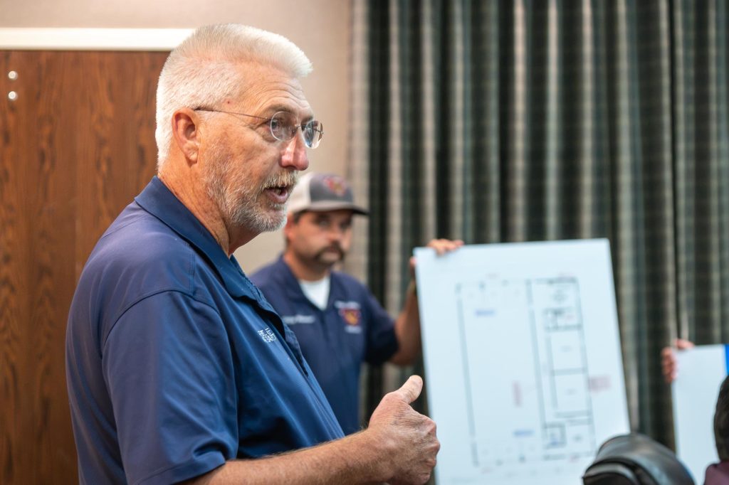 Man addressing board meeting