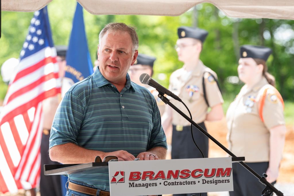 man addressing crowd