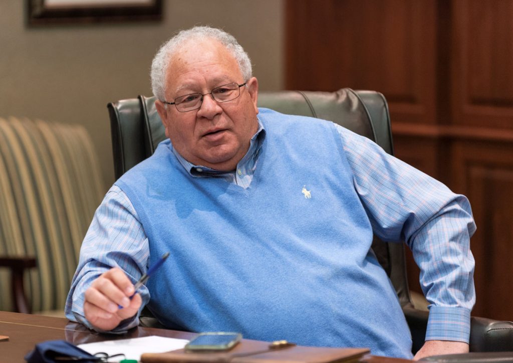 Gene Smith in a board meeting